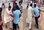 পাটওয়ারীর ওপর হামলার সময় অস্ত্রসদৃশ বস্তু বের করা তরুণ কে
