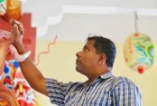 যশোরের শিল্পী হারুন হাফিজের তুলির আঁচড়ে মালয়েশিয়া জয়